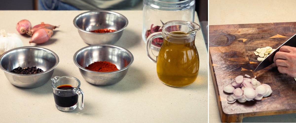 Preparing ingredients for cannabis-infused chilli olive oil, including olive oil, chilli flakes, spices, and slicing garlic and shallots on a wooden board