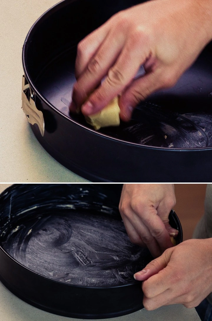 Greasing a springform cake pan with butter, first step for baking a homemade cannabis space cake