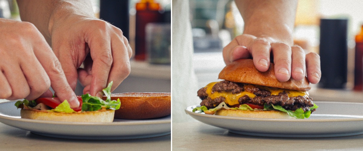 Assembling and serving a finished cannabis burger with melted cheddar, lettuce, tomato, and an infused bun