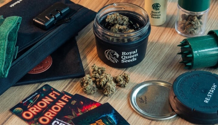 Cannabis Storage Essentials in One Setup Image showing cannabis buds and several storage accessories arranged on a wooden surface.