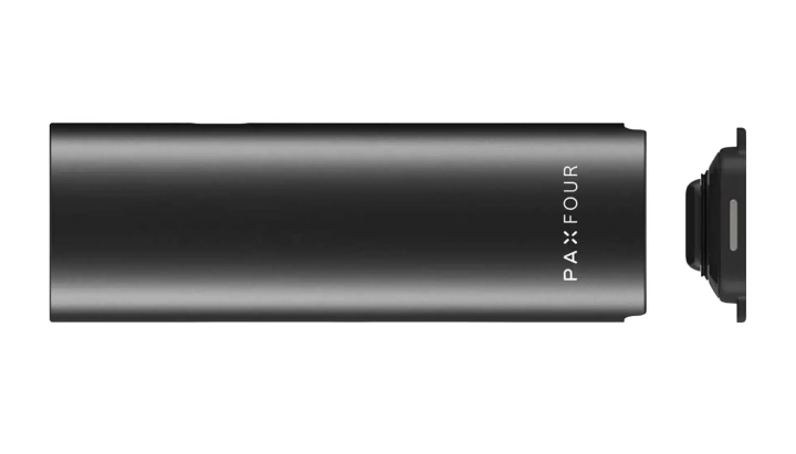 PAX Four Vaporizer Handheld Product View PAX Four vaporizer held in one hand, showing its slim matte body, compact size, and LED petal indicator on the front